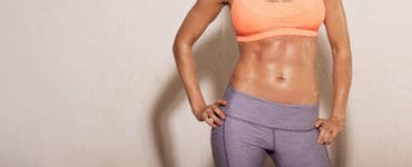 Frau mit Sixpack